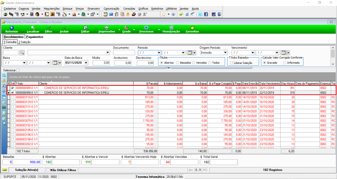 Tela Movimento_Financeiro – Contas a Receber com 182 registros listados; dois primeiros títulos (0000006989-0 1/1 e 0000006990-0 1/1) do cliente COMERCIO DE SERVICOS DE INFORMATICA EIRELI marcados na coluna Sel com valor de parcela R$ 70,00 cada e $ a Baixar R$ 70,00 cada; rodapé mostra total geral de 536.856,88 e $ a Baixar 140,00