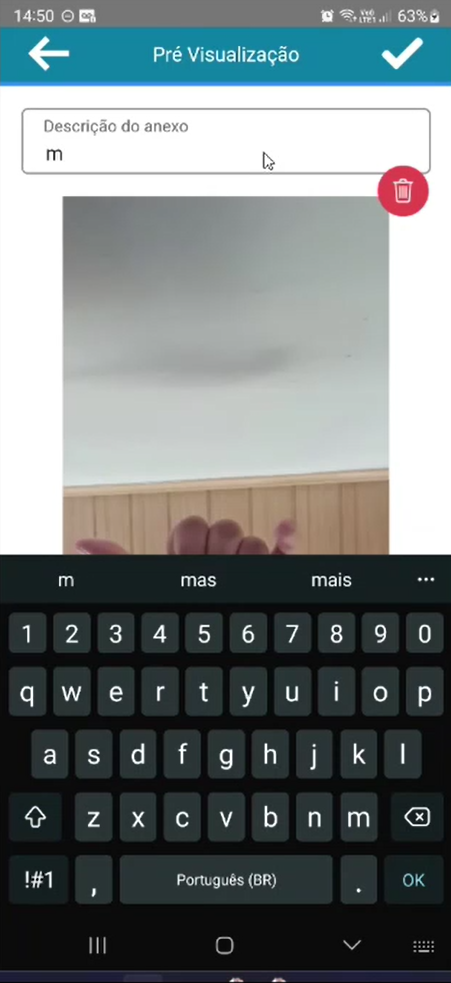 Tela "Pré Visualização" com o campo "Descrição do anexo" em edição e a miniatura da foto capturada; teclado exibido