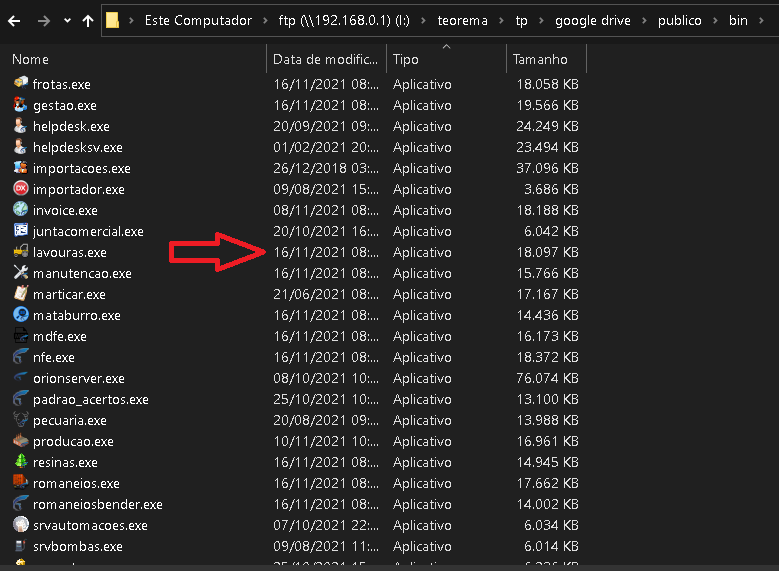 Windows Explorer aberto em ftp (\\192.168.0.1) (I:) > teorema > tp > google drive > publico > bin, listando executáveis como frotas.exe, gestao.exe, helpdesk.exe, nfe.exe, entre outros, com seta vermelha apontando para lavouras.exe
