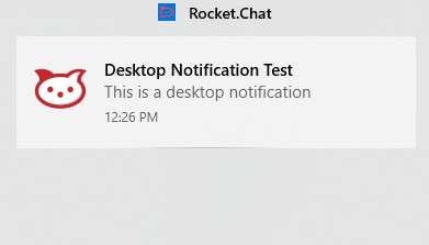 Notificação de área de trabalho do Rocket.Chat exibindo "Desktop Notification Test" com mensagem "This is a desktop notification" às 12:26 PM