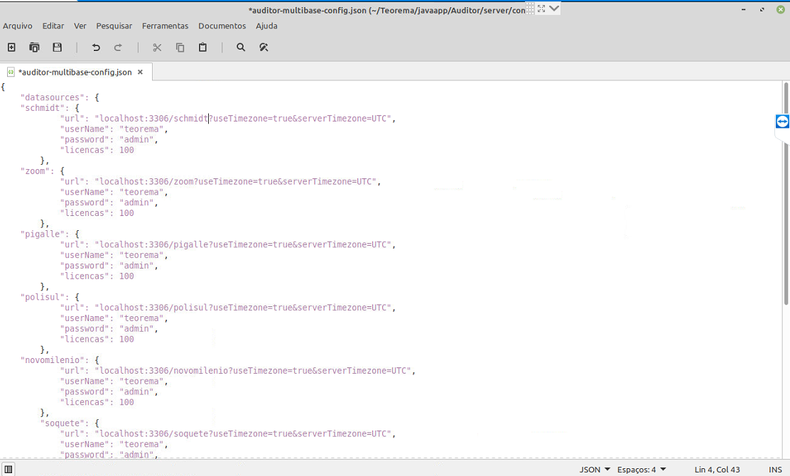 Editor de texto exibindo o arquivo auditor-multibase-config.json com a nova entrada schmidt adicionada na seção dataSources, seguida das entradas zoom, pigalle, polisul, novomilenio e soquete