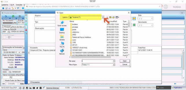 Janela Open do Windows com campo "Look in" mostrando "Teorema (T:)" e seta de seleção indicada; lista exibe pastas de rede mapeadas