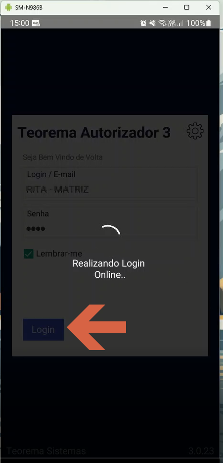 Tela de login do Teorema Autorizador 3 com campos Login / E-mail preenchido com "RITA - MATRIZ", Senha preenchida, checkbox Lembrar-me marcado e mensagem "Realizando Login Online.." com botão Login destacado por seta