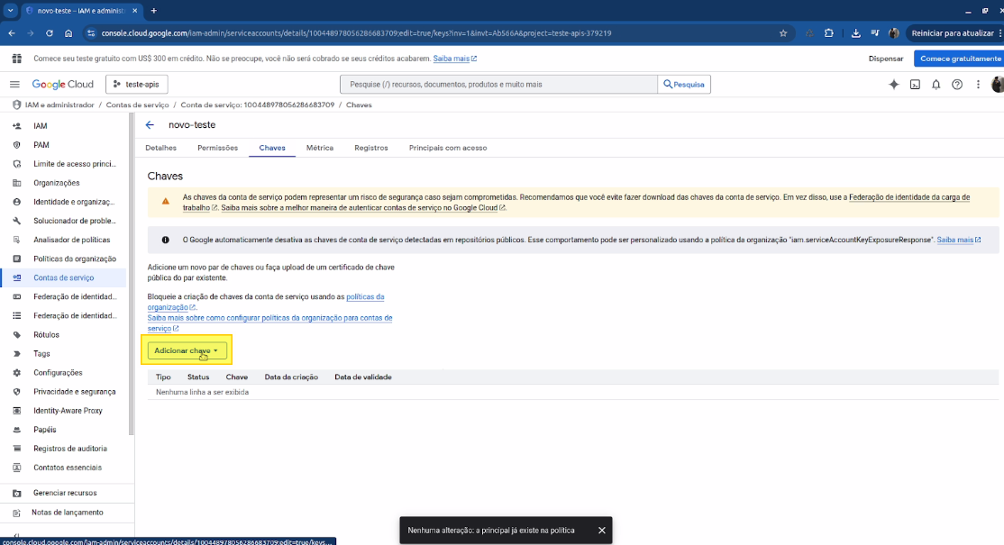 Aba Chaves da conta de serviço novo-teste com aviso de segurança do Google e botão Adicionar chave destacado em amarelo; tabela de chaves vazia