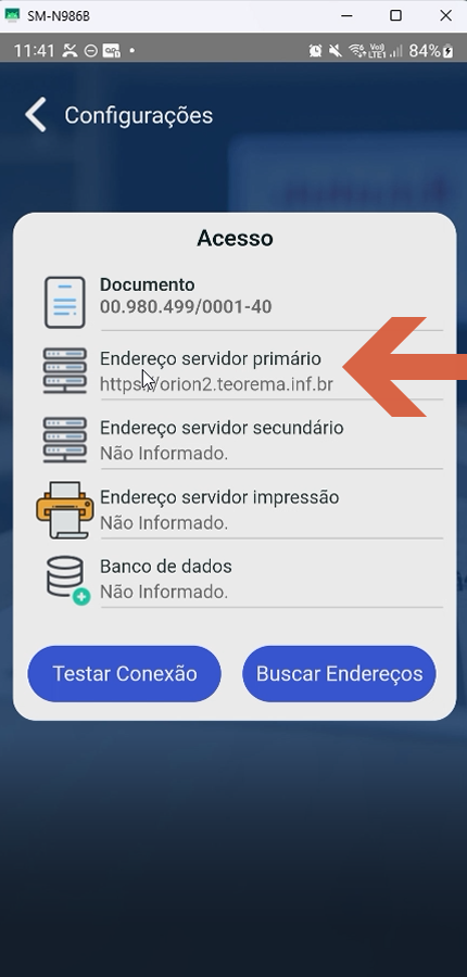 Tela de Configurações > Acesso do aplicativo Teorema O.P. em dispositivo móvel (SM-N986B) exibindo os campos: Documento "00.980.499/0001-40", Endereço servidor primário "https://orion2.teorema.inf.br", Endereço servidor secundário "Não Informado.", Endereço servidor impressão "Não Informado.", Banco de dados "Não Informado." e botões "Testar Conexão" e "Buscar Endereços"; seta vermelha aponta para o campo "Endereço servidor primário"