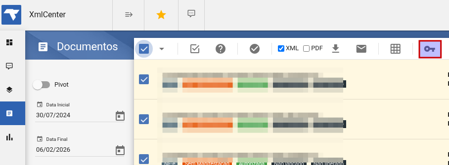 Tela Documentos do XmlCenter com vários documentos selecionados e o botão de chave (Autorizar transportador) destacado na toolbar superior