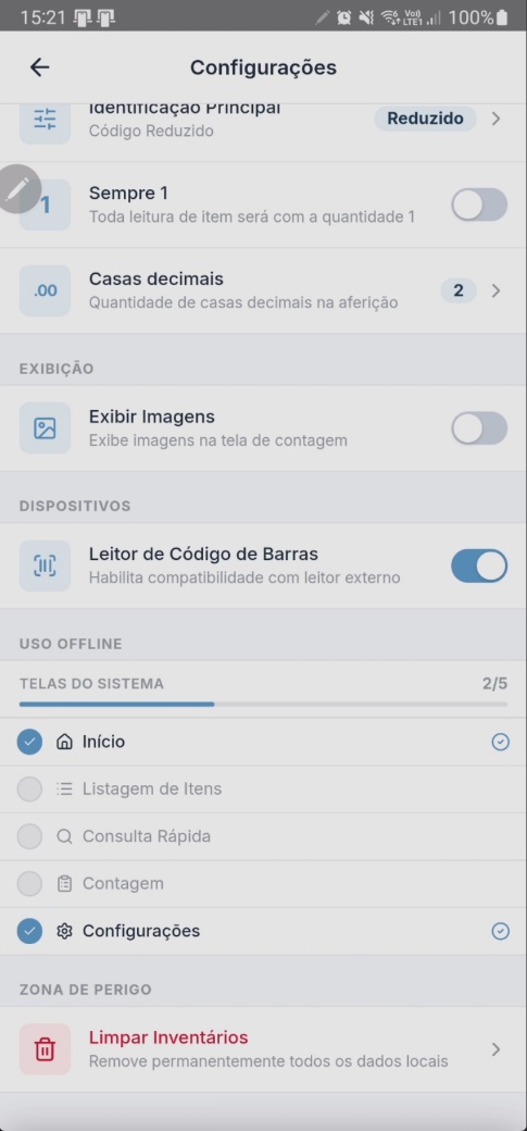 Tela de Configurações com a opção "Leitor de Código de Barras" habilitada por toggle, com descrição "Habilita compatibilidade com leitor externo"